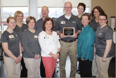 Picture of Myrtue Medical Center's Physical Therapy receiving 2016 Clinical Site of Excellence award from Creighton University.