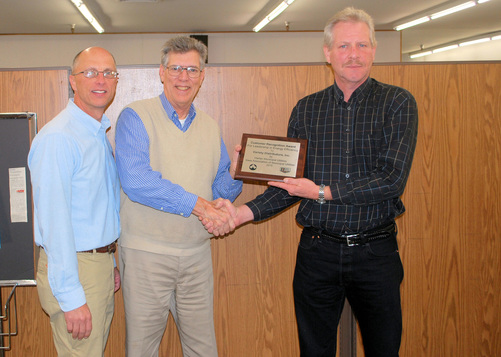 Picture of Variety Distributors, Inc receiving an Energy Efficiency from Iowa Association of Municipal Utilities (IAMU).